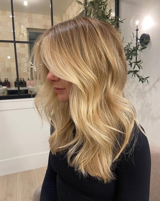 17. Bright Honey Blonde Layers with Creamy Face Frame - Honey Blonde Hair with Highlights