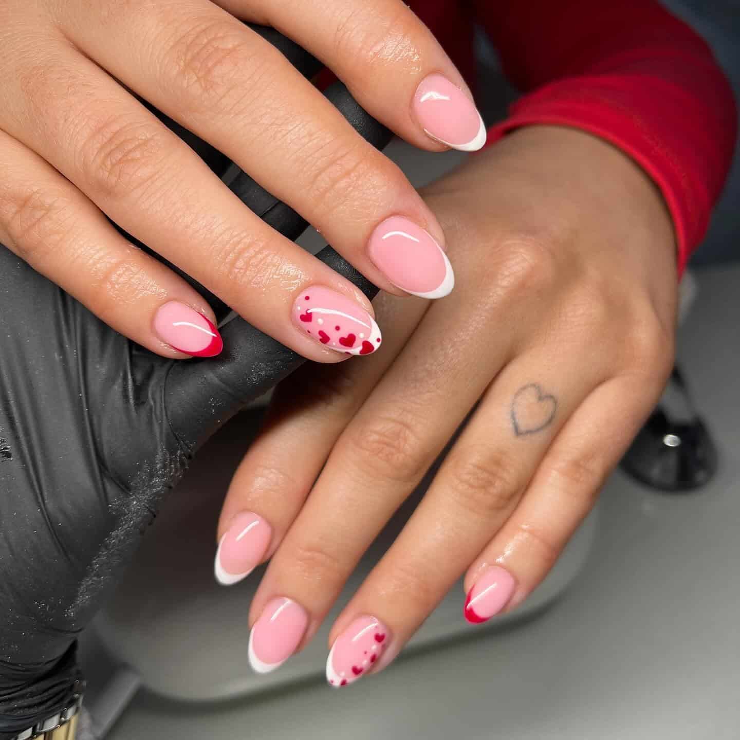 3. Pink French Tip Nails with Red Heart Accents - february nail ideas