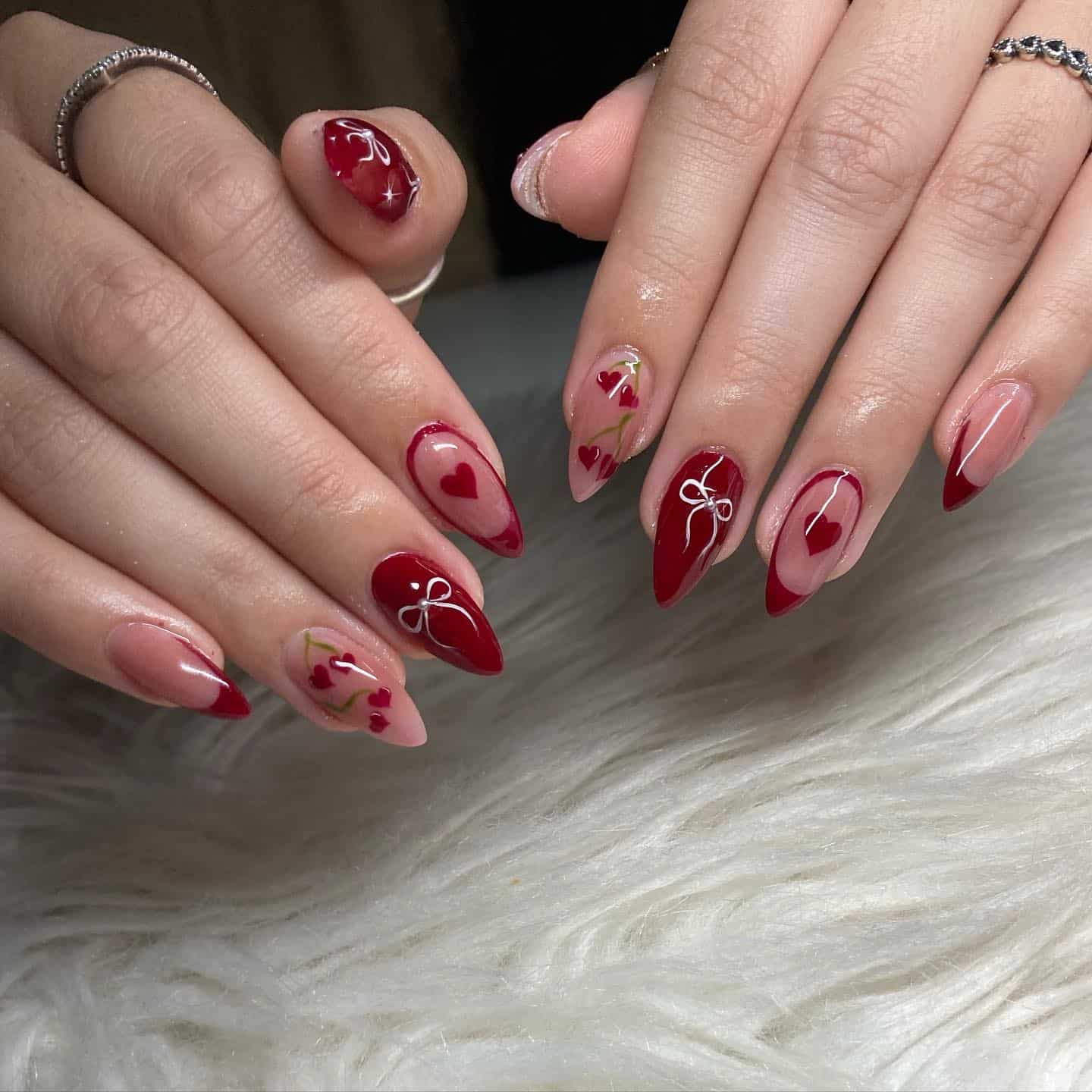 5. Cherry Red Almond Nails with Hearts and Bows - february nail ideas
