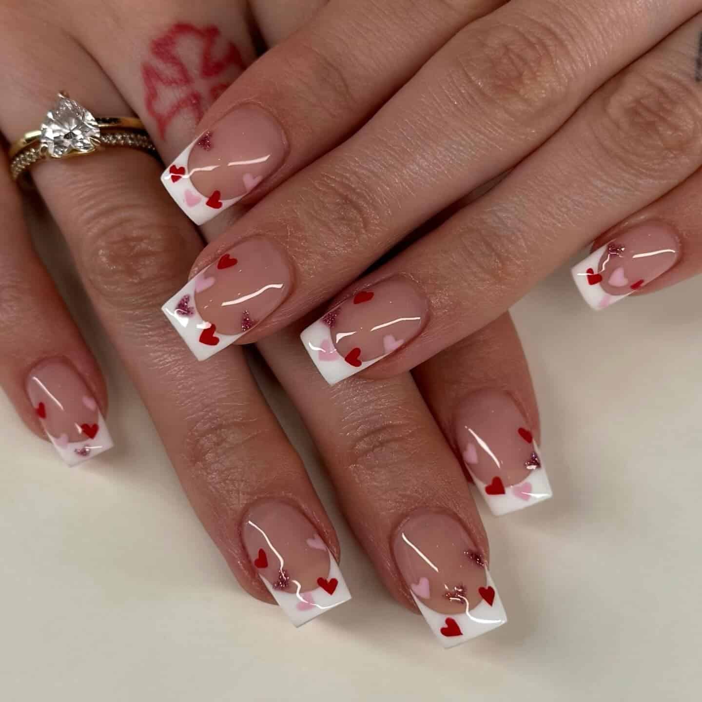14. White Square French Nails with Pink and Red Hearts - february nail ideas