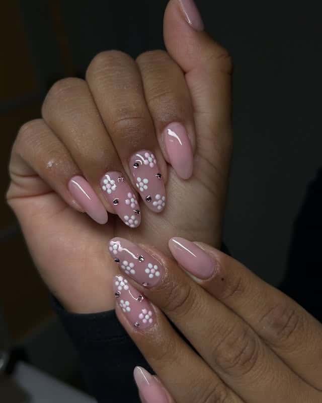 18. Blush Pink Almond Nails with White Floral Art - february nail ideas