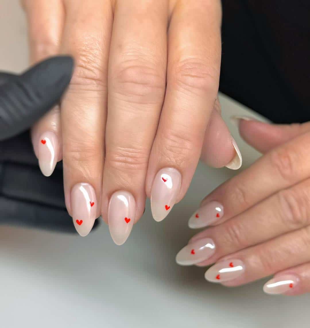 19. Milky Pink Almond Nails with Tiny Red Hearts - february nail ideas