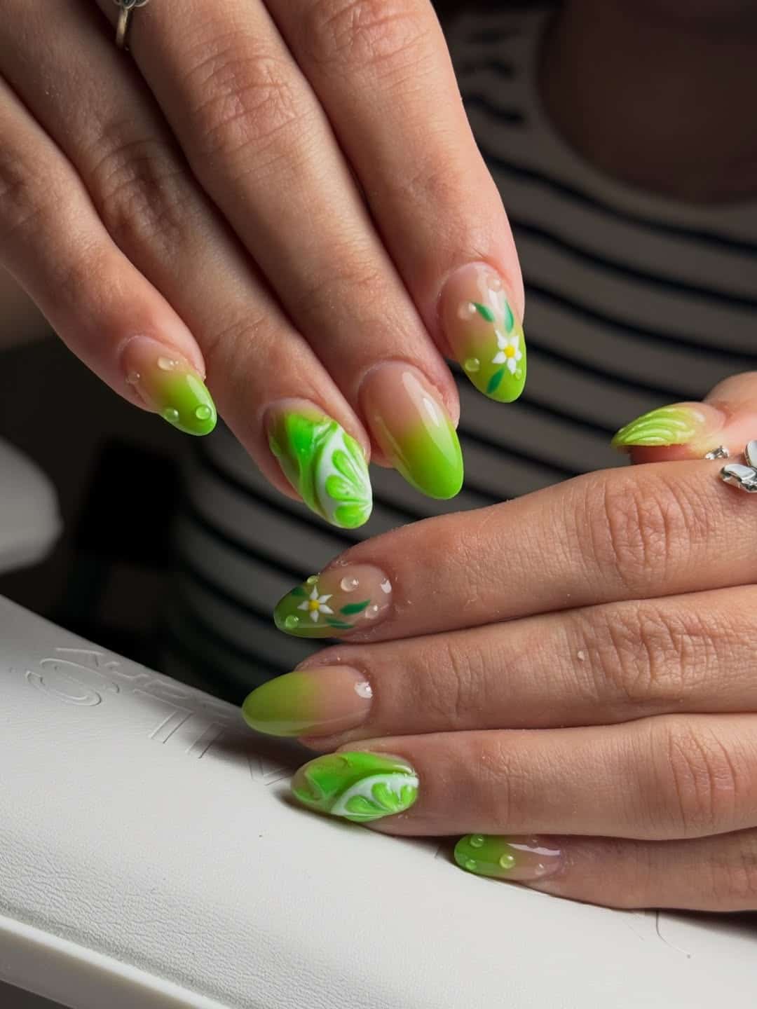 7. Lime Green Floral Almond Nails - lime green nail ideas