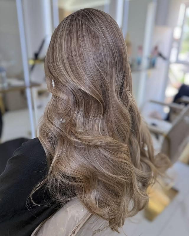 13. Cool Taupe Dark Blonde Glam Waves - Dark Blonde Hair Color