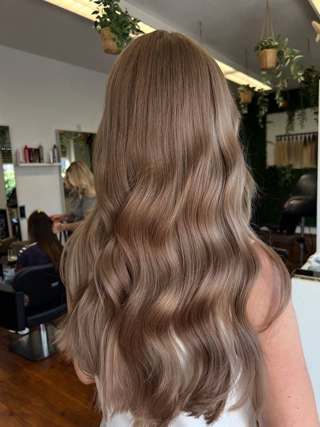 17. Neutral Dark Blonde Glossy Waves - Dark Blonde Hair Color
