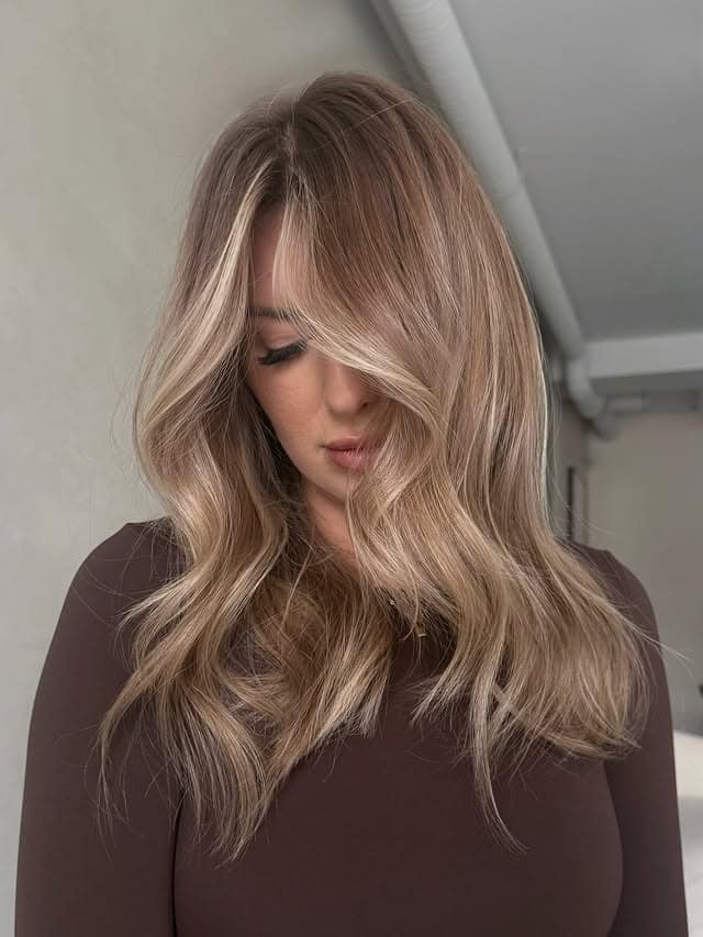 22. Beige Dark Blonde Face-Framing Waves - Dark Blonde Hair Color