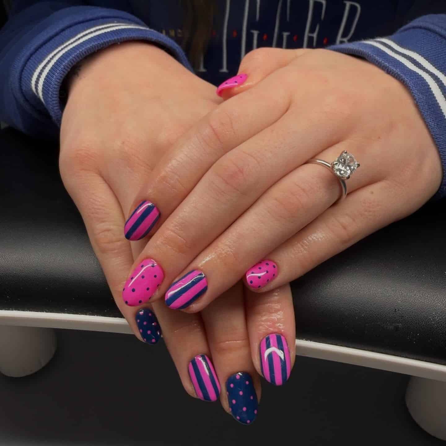 15. Pink and Navy Striped Short Nails - pink and blue nail ideas