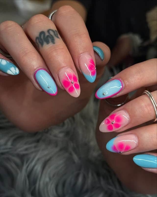 18. Pink and Blue Airbrush Flower Almond Nails - pink and blue nail ideas