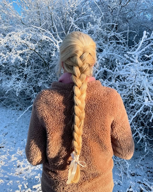 8. Golden Blonde Long Classic Braid - Winter Hairstyles