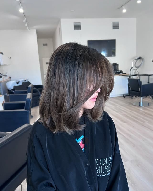 15. Smoky Brunette Layered Lob - Winter Hairstyles