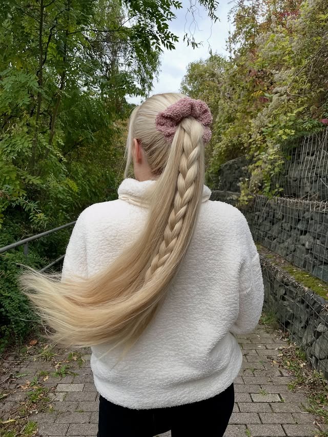 18. Creamy Blonde Braided Ponytail - Winter Hairstyles