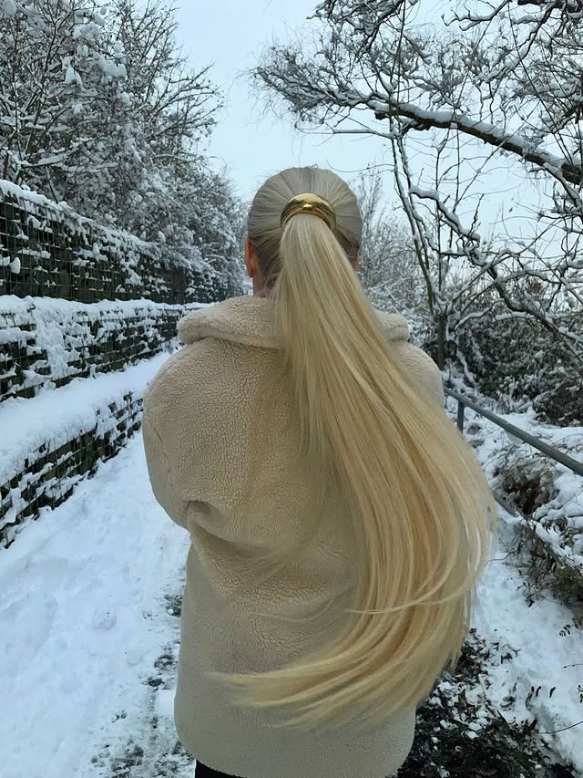 19. Pale Golden Blonde Sleek Ponytail - Winter Hairstyles