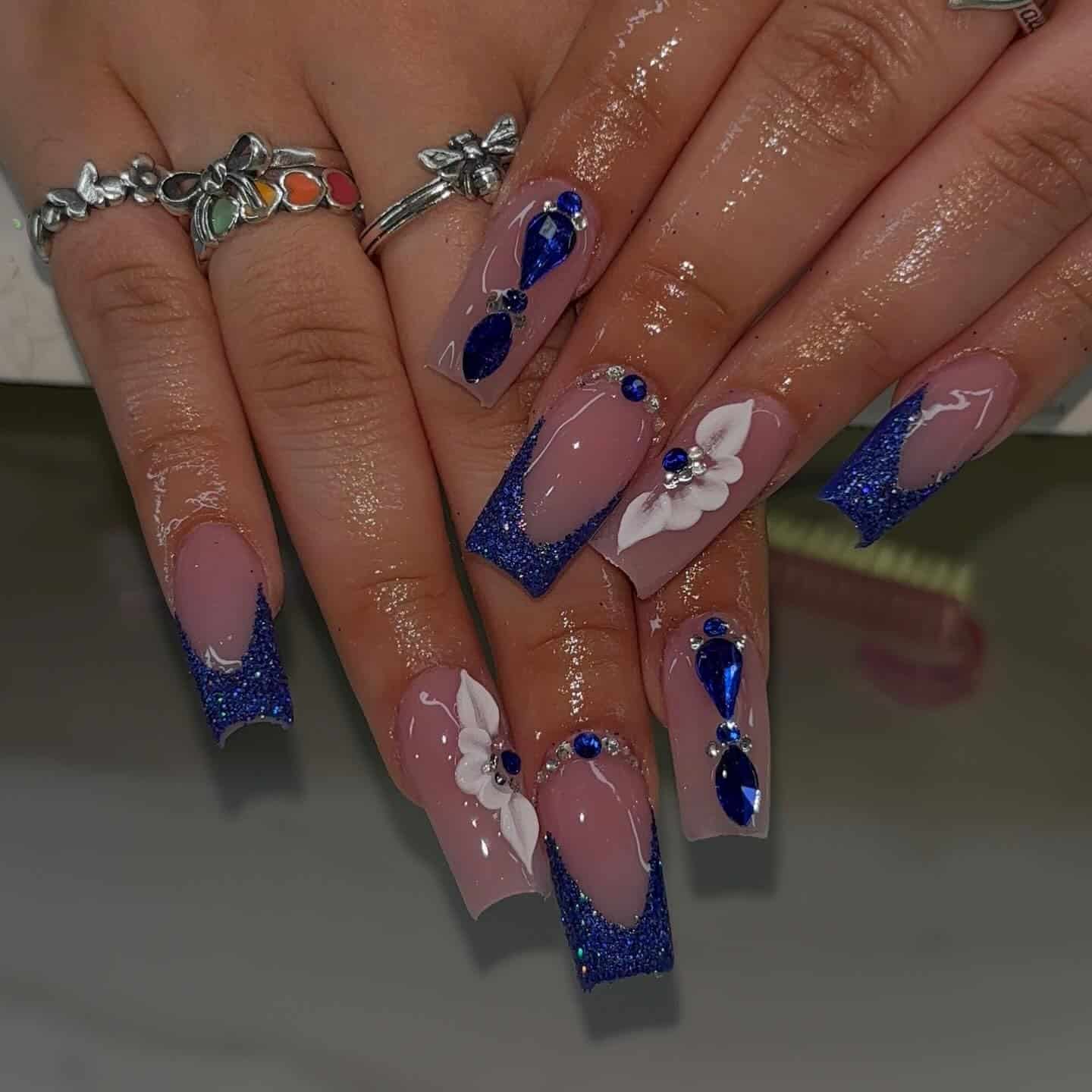 1. Royal Blue Glitter French Square Nails - prom nail ideas