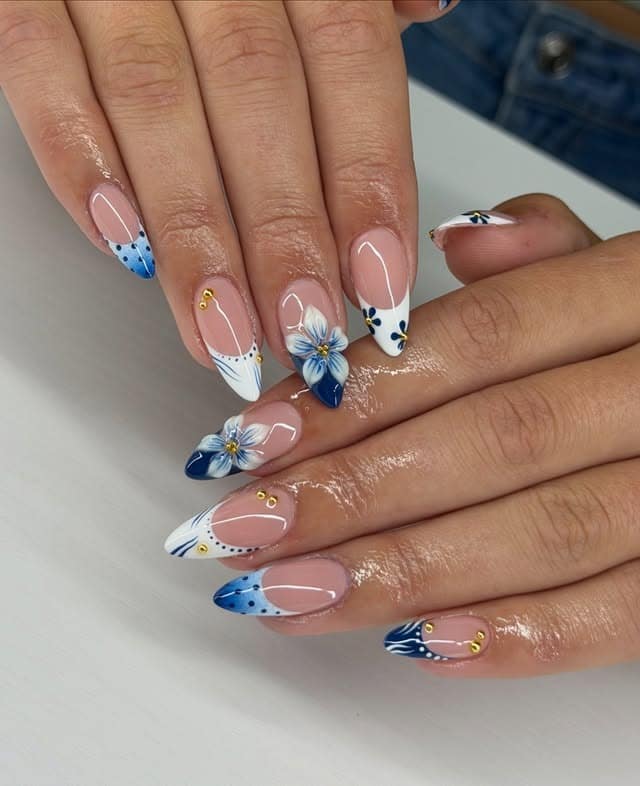 13. Blue and White Floral Almond Nails - prom nail ideas