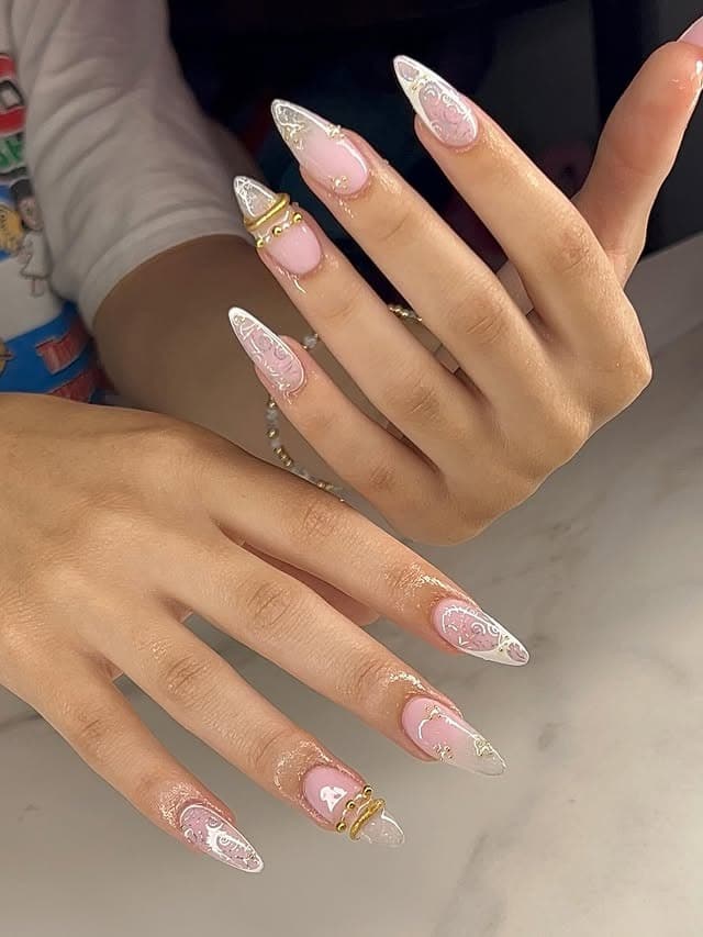 16. Pink and Silver Ornamental Stiletto Nails - prom nail ideas