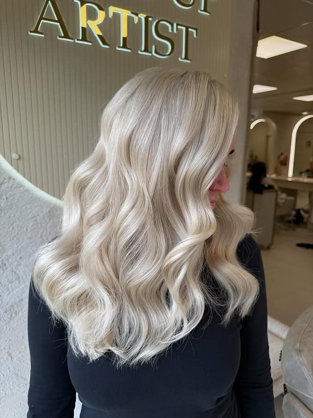 8. Pearl Platinum Blonde with Voluminous Curls - Platinum Blonde Hair
