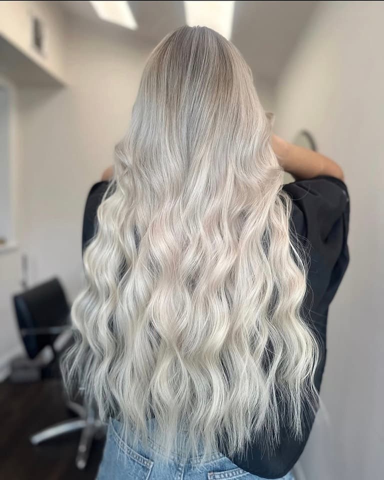 14. Silver Platinum Blonde with Extra-Long Waves - Platinum Blonde Hair