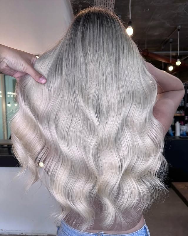 15. Rooted Pearl Platinum Blonde with Glossy Waves - Platinum Blonde Hair