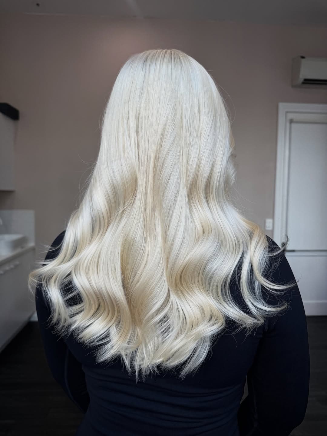 21. Creamy Platinum Blonde with Polished Waves - Platinum Blonde Hair