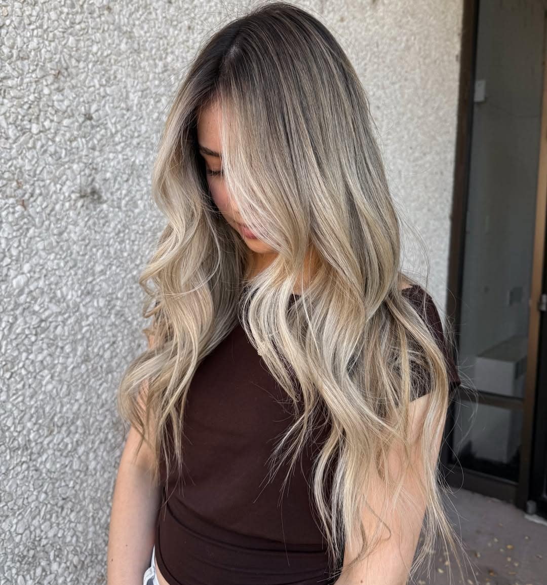 10. Wavy Dark Blonde with Creamy Blonde Highlights - Dark Blonde Hair Color with Highlights