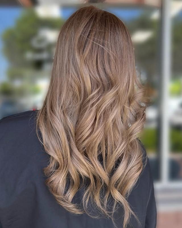 15. Soft Dark Blonde Waves with Honey Highlights - Dark Blonde Hair Color with Highlights