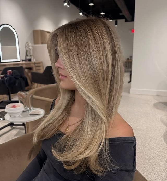 21. Silky Dark Blonde Layers with Beige Highlights - Dark Blonde Hair Color with Highlights