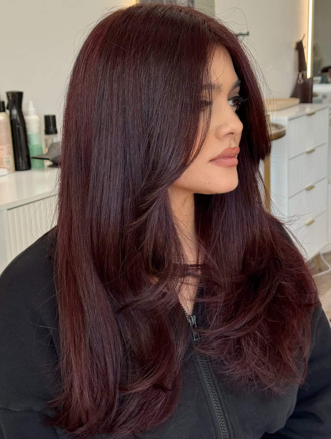 5. Sleek Cherry Cola Layers with Curtain Framing - Cherry Cola Hair Color