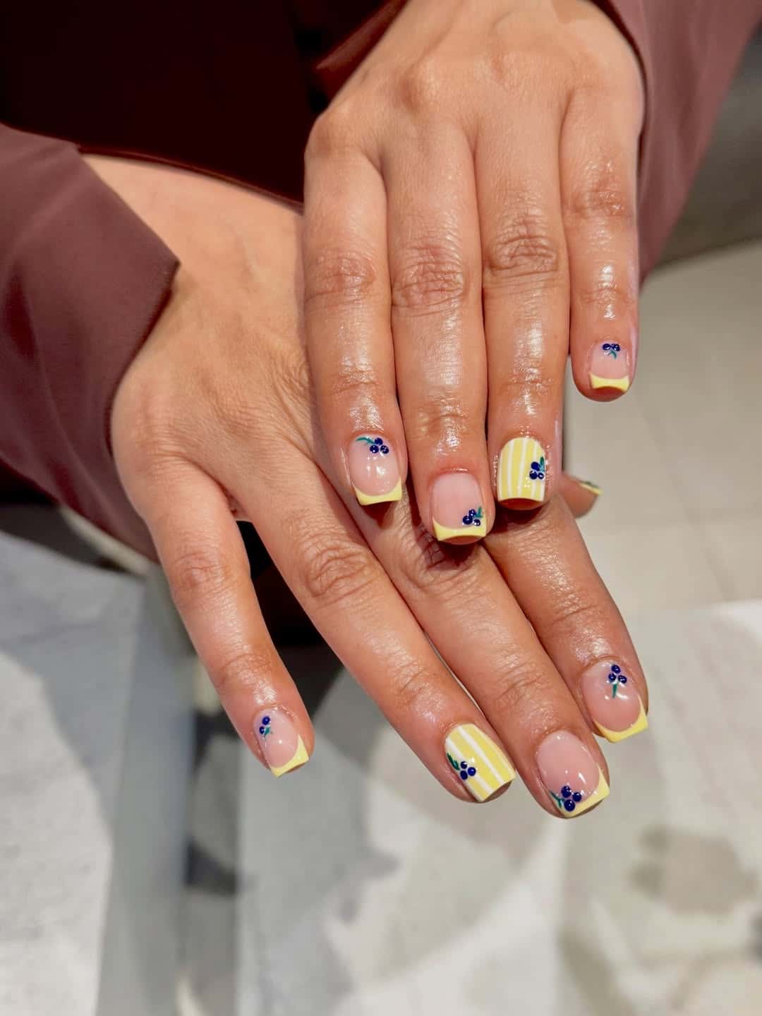 4. Lemon Yellow Cherry Short Nails - simple summer nail ideas