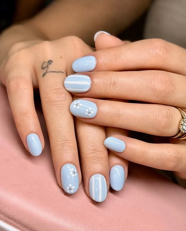 17. Baby Blue Stripe Short Oval Nails - simple summer nail ideas