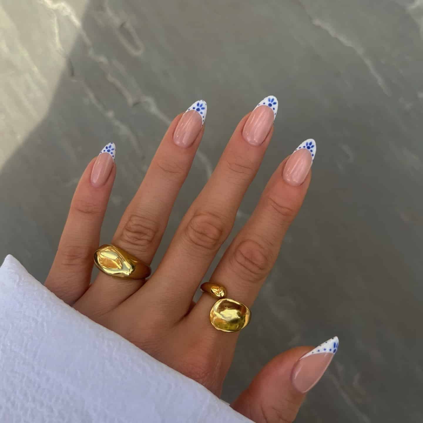 19. Blue Floral French Almond Nails - simple summer nail ideas