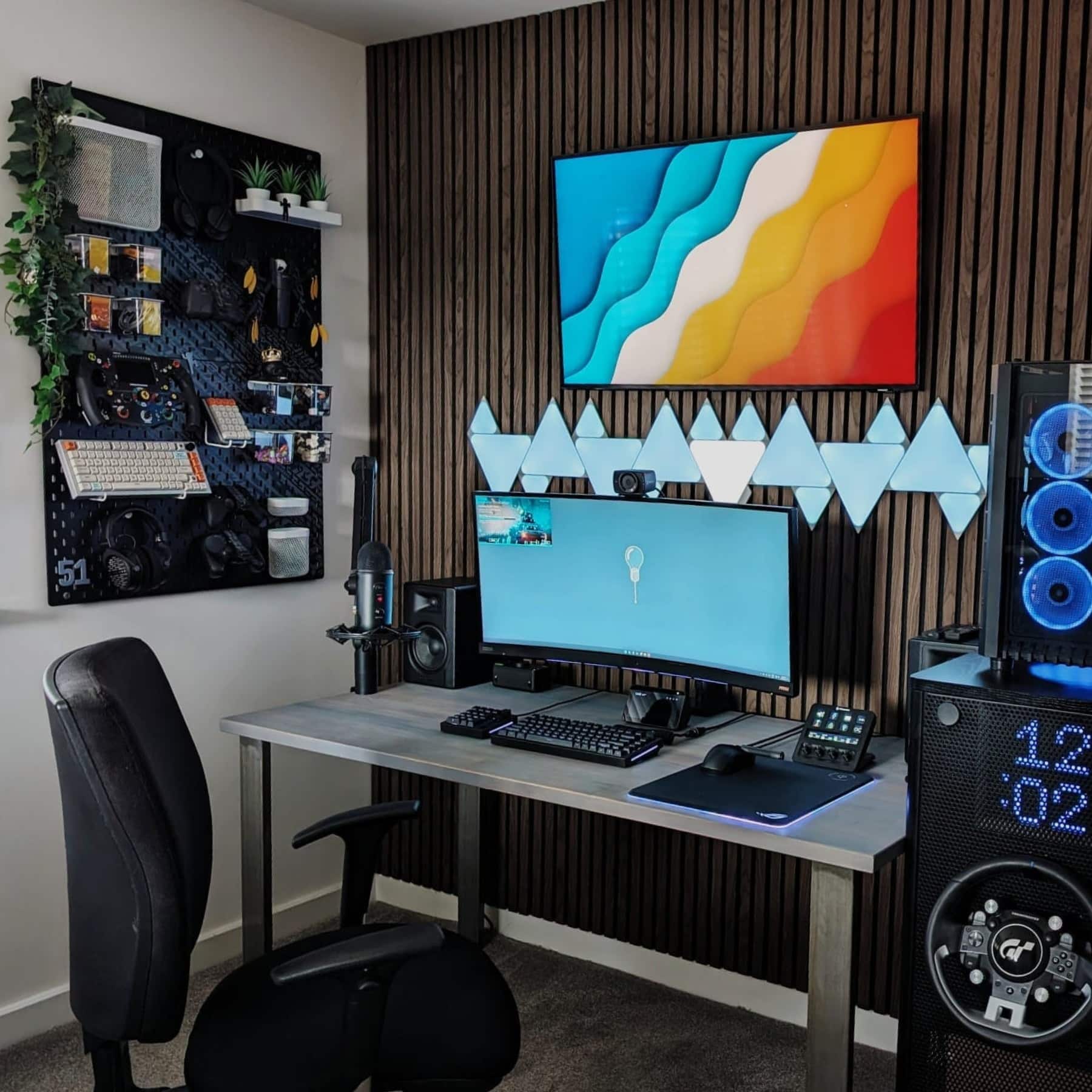 10. Dark Walnut and Cool Blue Gaming Office Idea - gaming office ideas