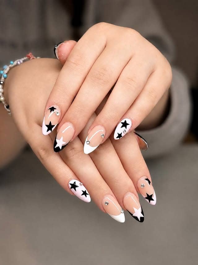 7. Nude, Black and White Star French Nails - star nail ideas