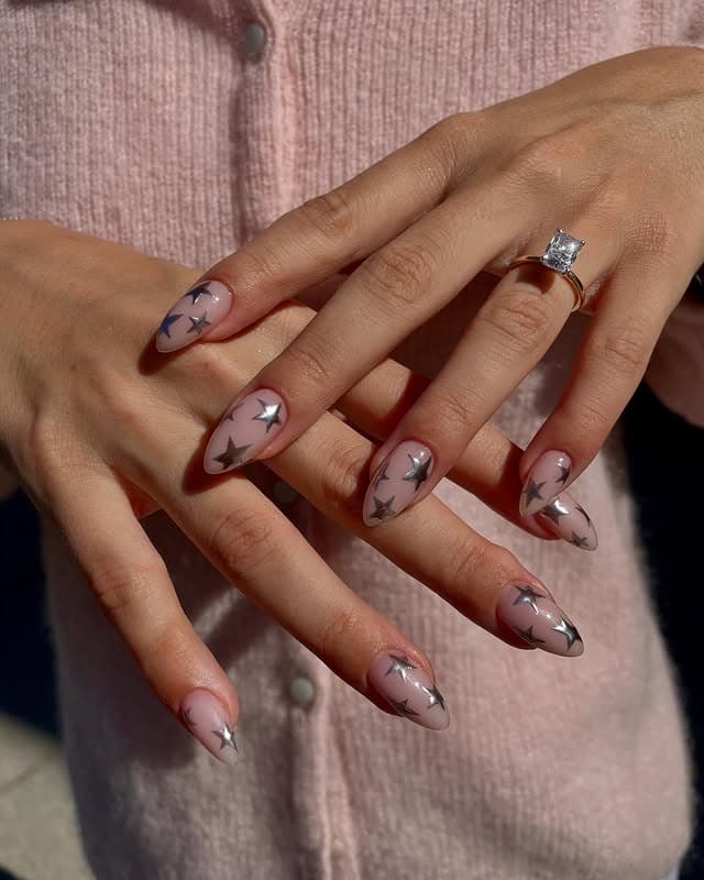 9. Sheer Pink and Silver Chrome Star Nails - star nail ideas