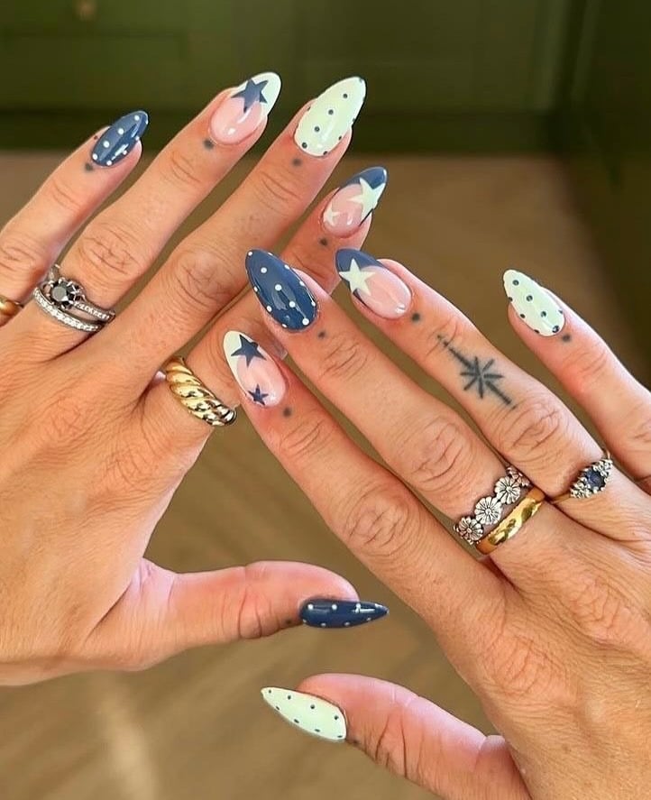13. Navy Blue and Mint Star Almond Nails - star nail ideas