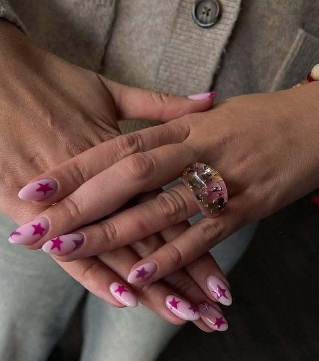 19. Soft Pink and Fuchsia Star Almond Nails - star nail ideas