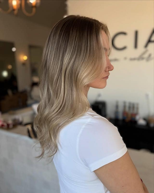 3. Creamy Dark-Rooted Blonde with Soft Waves - Old Money Hair
