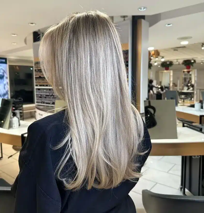 5. Icy Pearl Blonde with Sleek Layers - Old Money Hair