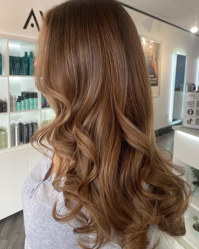 7. Caramel Chestnut Hair with Glossy Curls - Old Money Hair
