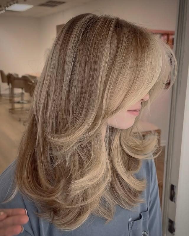12. Champagne Blonde Long Butterfly Cut - Old Money Hair