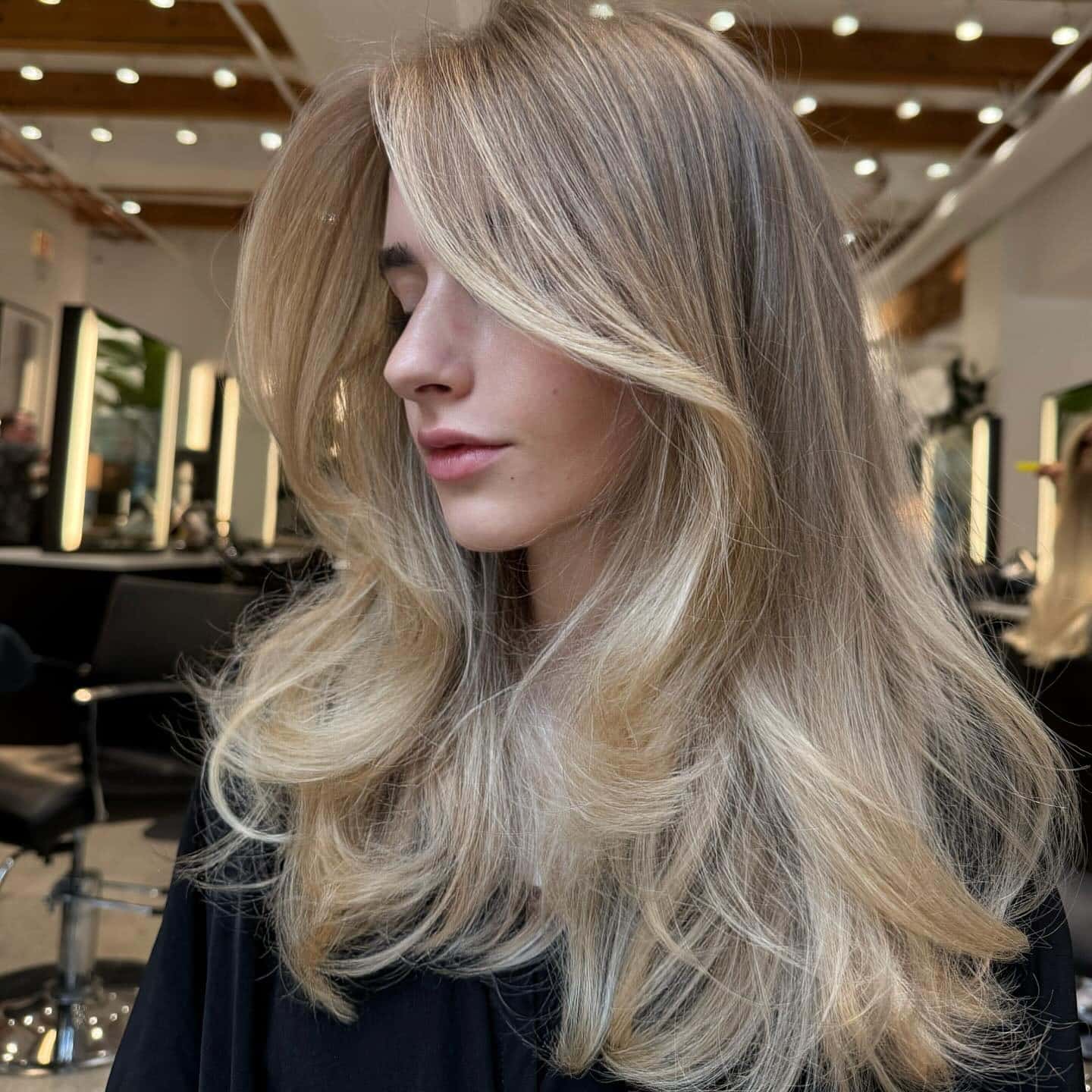 13. Pearl Beige Blonde with Bouncy Layers - Old Money Hair