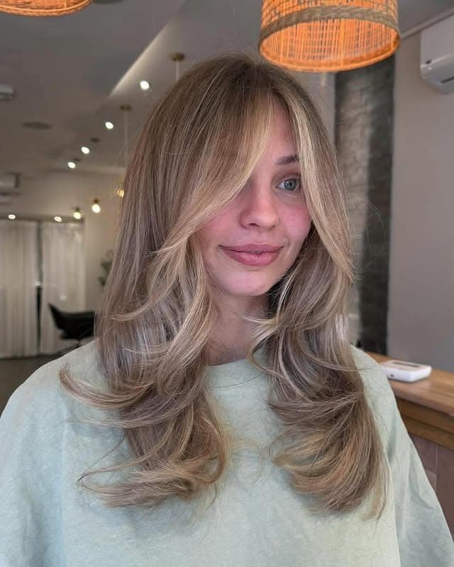 17. Sandy Blonde Face-Framing Layers - Old Money Hair