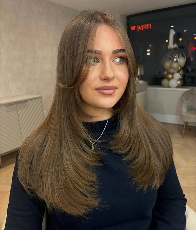 4. Light Ash Brown Long Layers with Soft Curtain Fringe - Face-Framing Haircuts