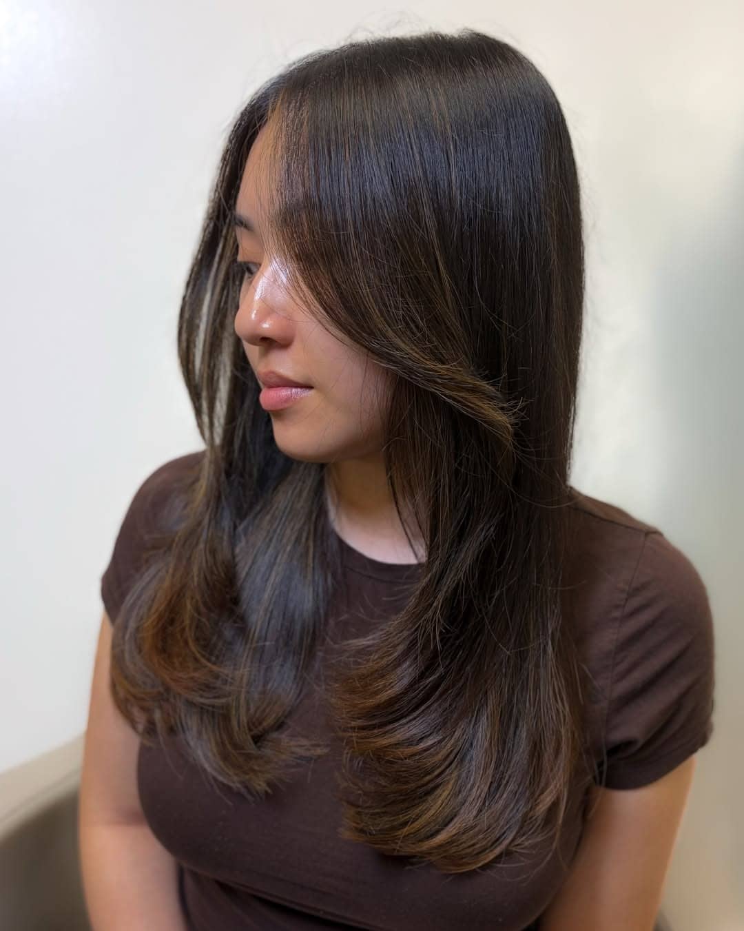 5. Dark Espresso Brown Hair with Feathered Face-Framing Layers - Face-Framing Haircuts