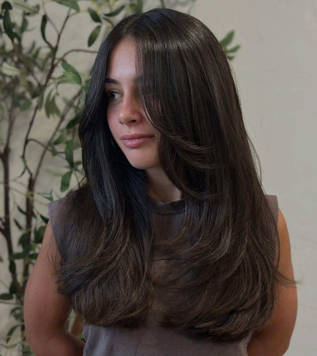 19. Dark Ash Brown Long Layers with Sweeping Curtain Bangs - Face-Framing Haircuts