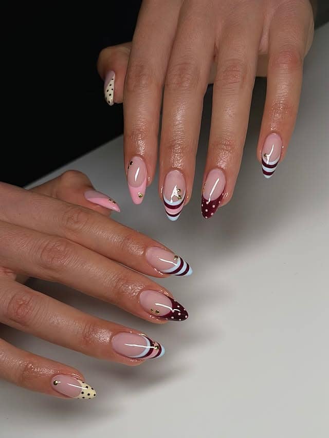 6. Burgundy and Baby Blue French Tip Nails with Polka Dots - aesthetic nail ideas