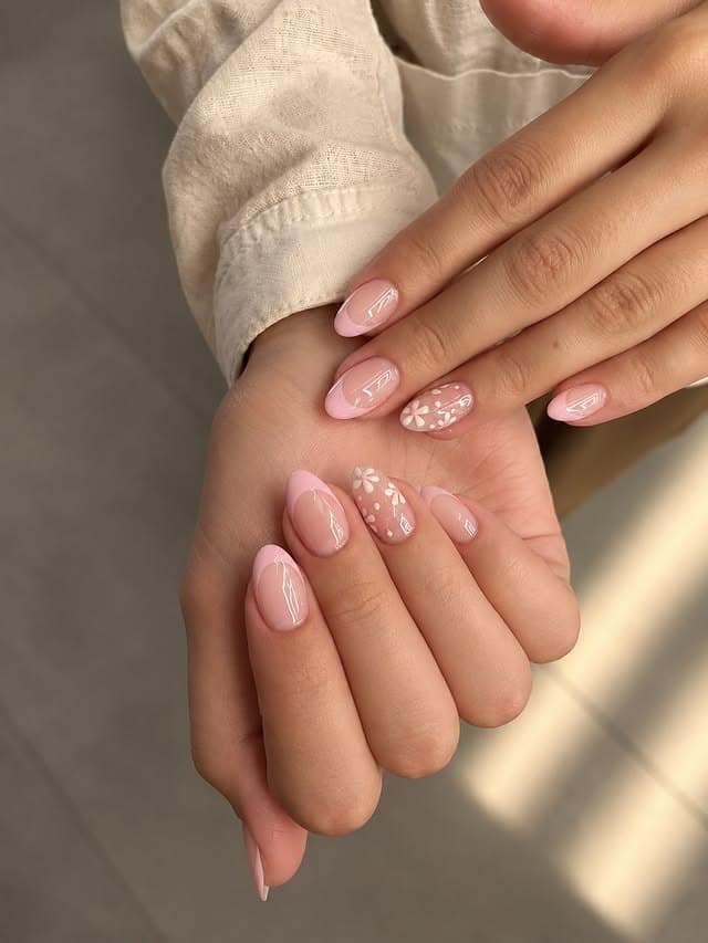 18. Soft Pink French Tip Nails with White Daisy Accents - aesthetic nail ideas