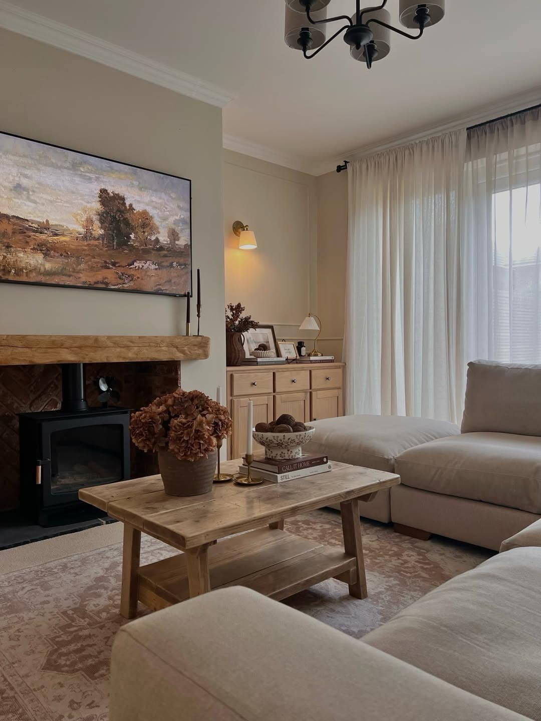 20. Classic Cream and Honey Oak Fireplace Living Room Idea - comfy living room ideas