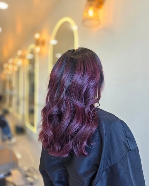 1. Burgundy Plum Balayage with Soft Waves - Burgundy Balayage Hair Color