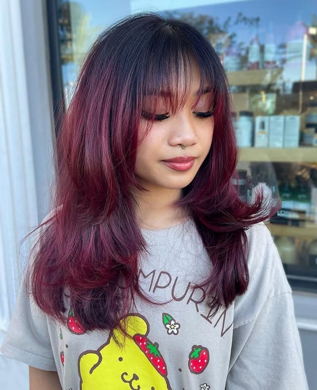2. Burgundy Rose Balayage with Wispy Bangs - Burgundy Balayage Hair Color