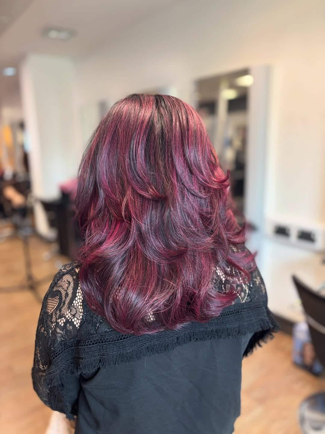 3. Vibrant Burgundy Balayage with Feathered Layers - Burgundy Balayage Hair Color